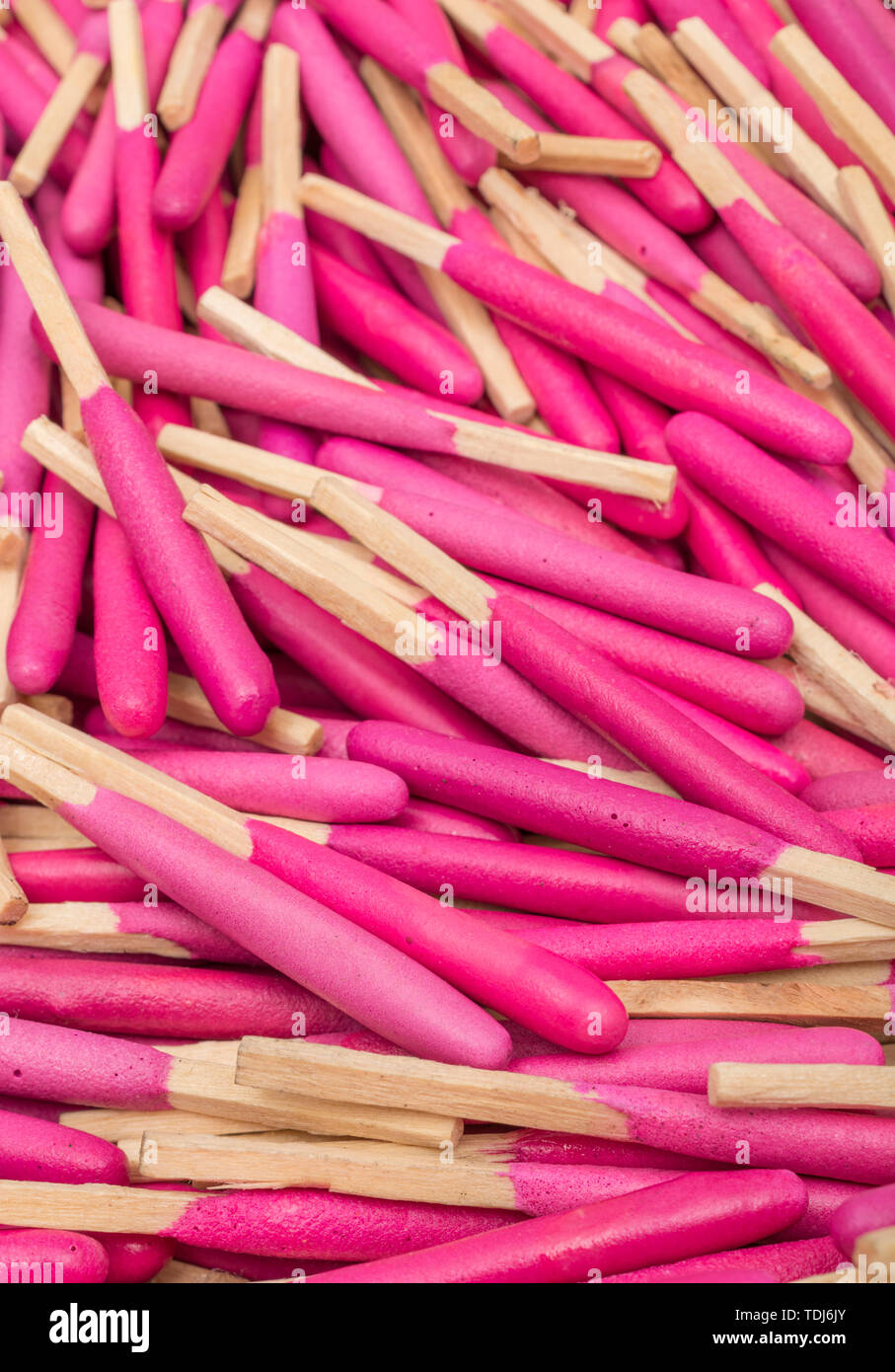 Macro close-up random pile of waterproof emergency matches. Metaphor survival skills, chaotic mind, disorganized, random, macro close-up matches. Stock Photo