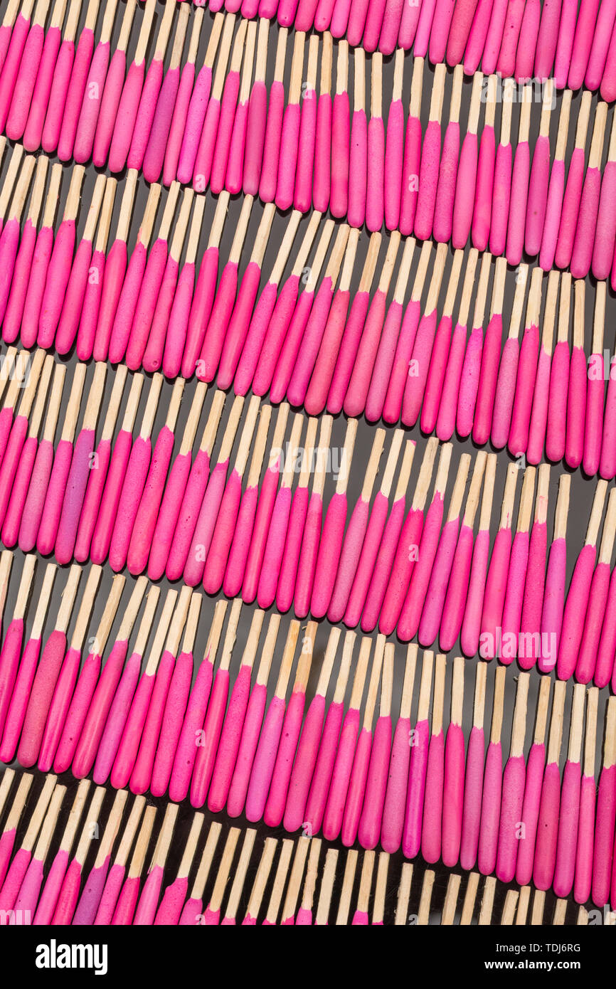 Neat rows of waterproof stormproof emergency matches. Metaphor survival skills, organized mind, neat and tidy mind, regimented, lined up, in neat line Stock Photo