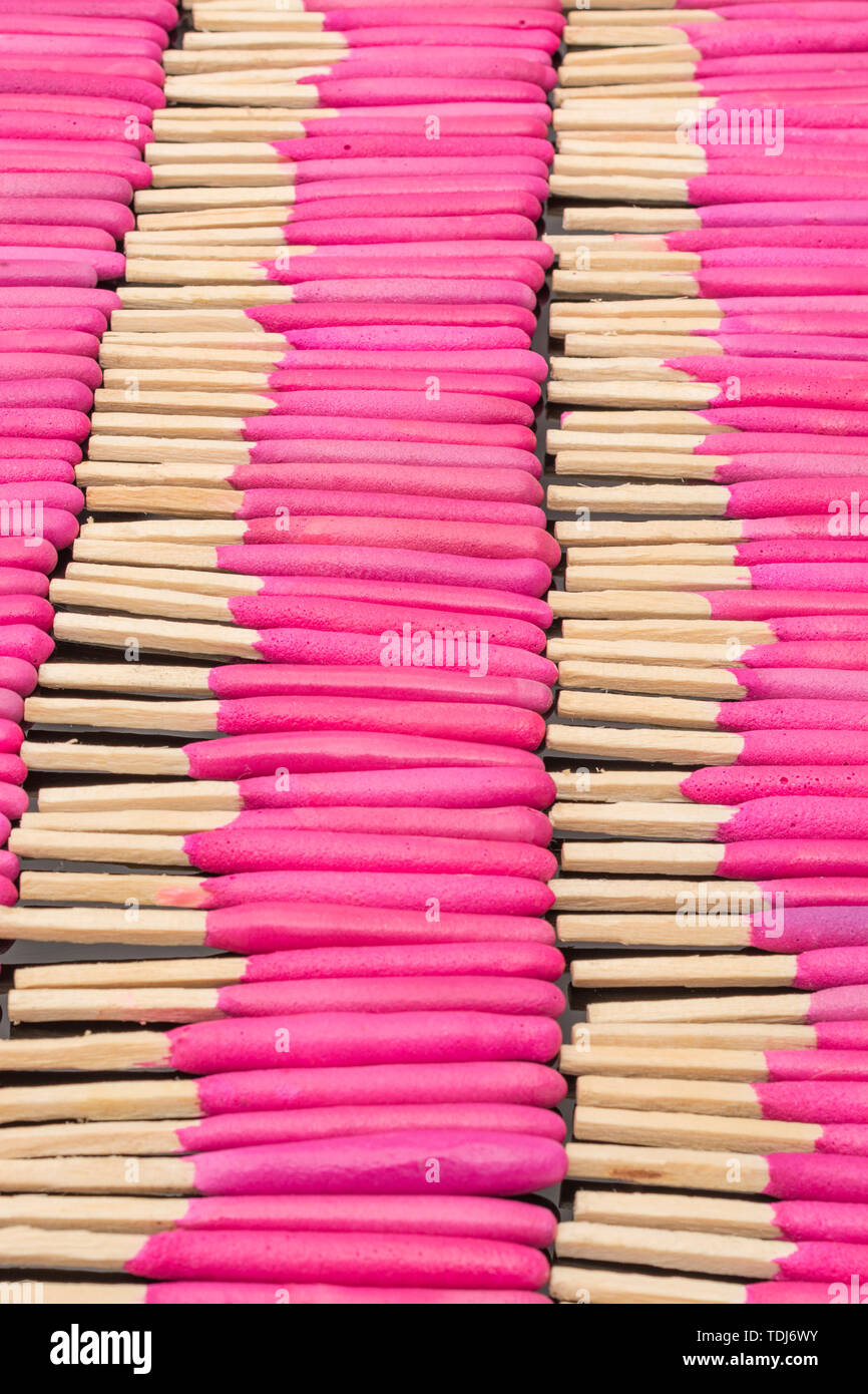 Neat rows of waterproof stormproof emergency matches. Metaphor survival skills, organized mind, neat and tidy mind, regimented, lined up, in neat line Stock Photo