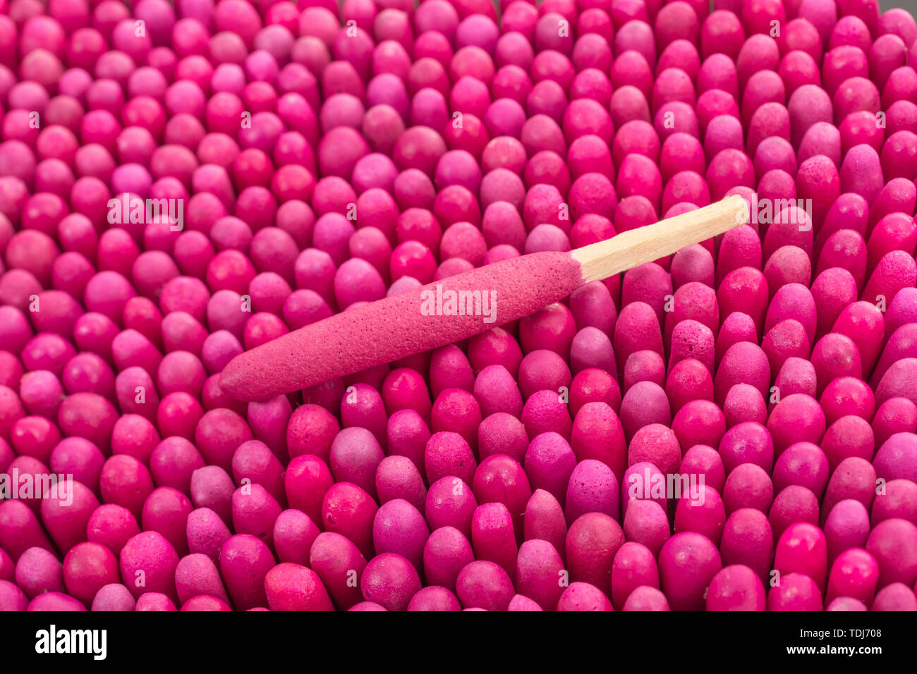 Macro close-up of massed waterproof stormproof emergency matches tightly packed. Metaphor survival skills, crammed, tight squeeze, jostling for space. Stock Photo