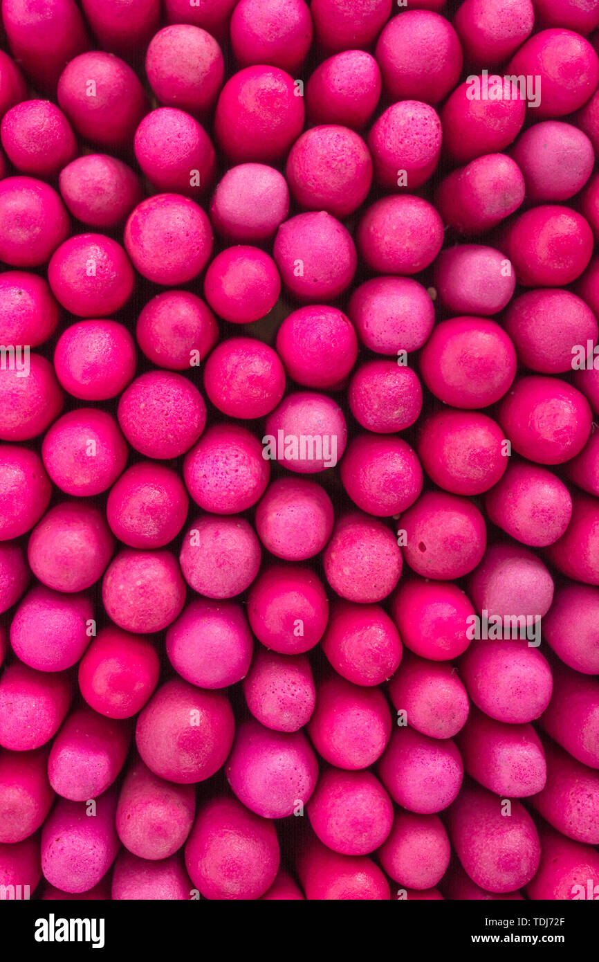 Macro close-up of massed waterproof stormproof emergency matches tightly packed. Metaphor survival skills, crammed, tight squeeze, jostling for space. Stock Photo