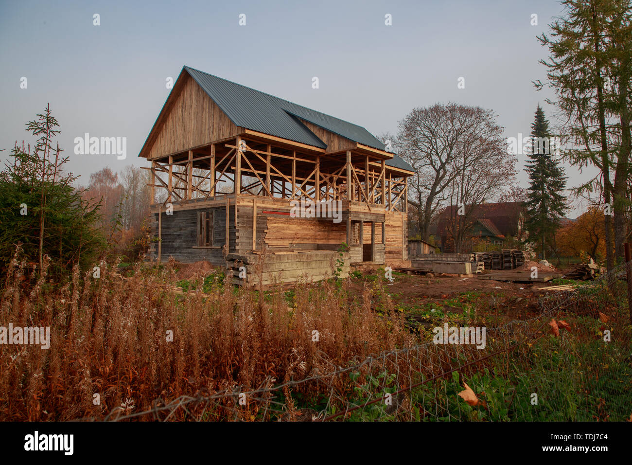 wooden construction of the house in the daytime outside view Stock Photo