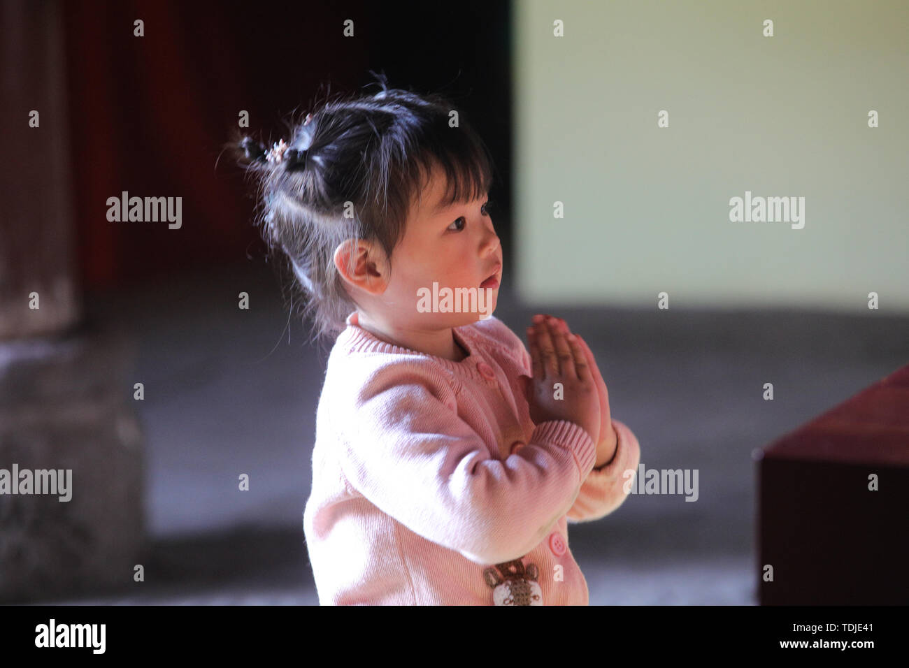 Little Buddha girl Stock Photo - Alamy