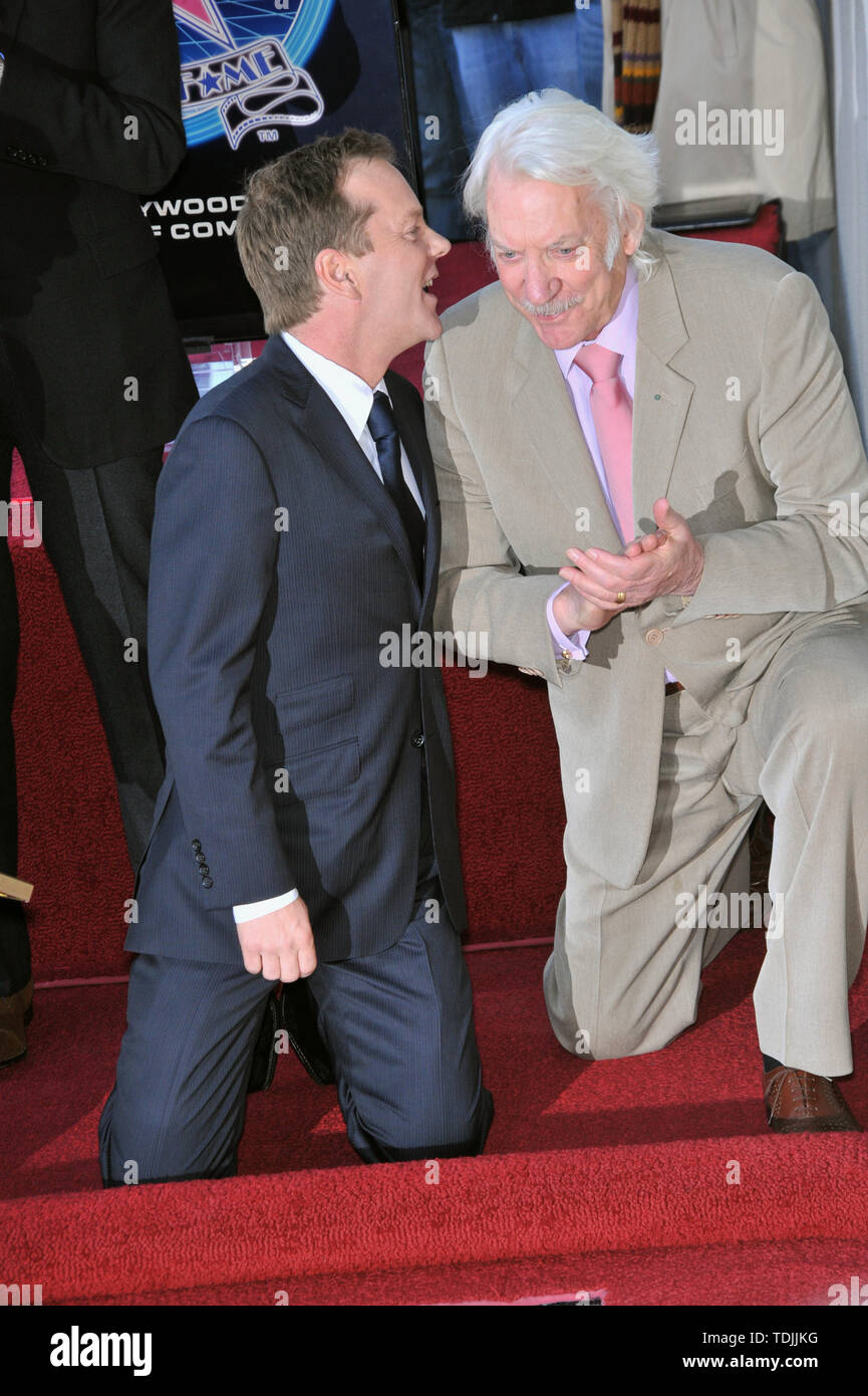 LOS ANGELES, CA. December 09, 2008: Kiefer Sutherland & father Donald Sutherland on Hollywood Boulevard where Kiefer was honored with the 7,024th at on the Hollywood Walk of Fame. © 2008 Paul Smith / Featureflash Stock Photo