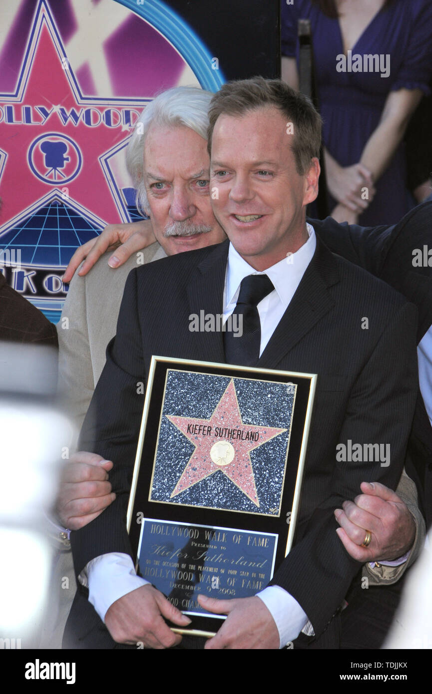LOS ANGELES, CA. December 09, 2008: Kiefer Sutherland & father Donald Sutherland on Hollywood Boulevard where Kiefer was honored with the 7,024th at on the Hollywood Walk of Fame. © 2008 Paul Smith / Featureflash Stock Photo