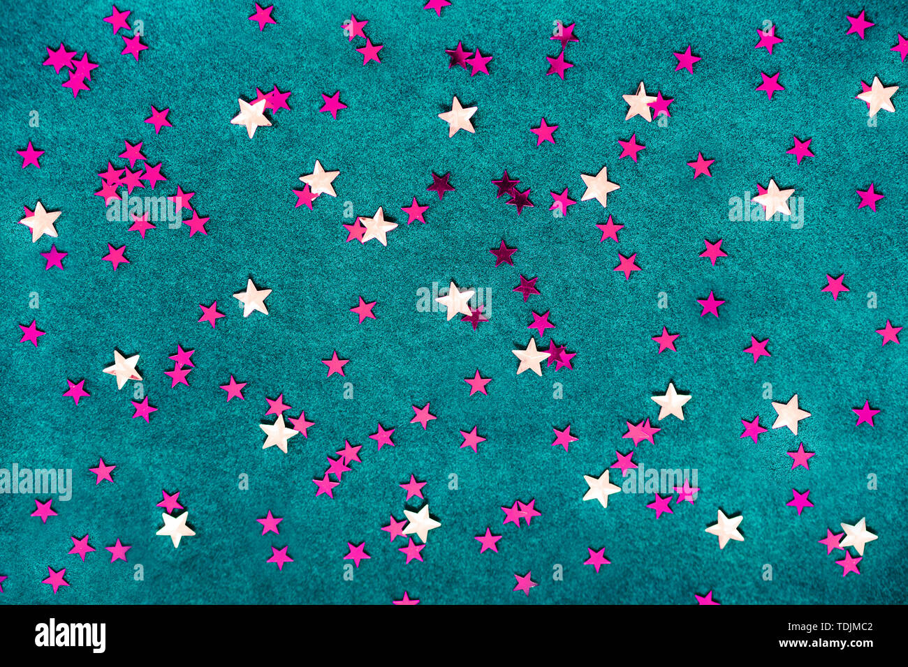 Blue background with yellow and pink stars Stock Photo Alamy
