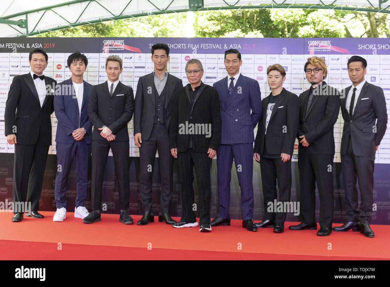 June 16, 2019 - Tokyo, Japan - (L to R) Tetsuya Bessho president of the Short Shorts Film Festival & Asia 2019 (SSFF & Asia, Hiroki Inoue, singer Ryuji Imaichi, actor Naoki Kobayashi, filmmaker Takashi Miike, Akira (Exile), dancer Reo Sano, director Hiroki Horanai and Hiro (Exile), pose for the cameras on the red carpet during the Award Ceremony at Jingu Kaikan. The SSFF & Asia is one of the largest international short film festivals in Asia held in Tokyo from May 29 to June 16. For the first time, the four winners of this years' festival will become eligible for the 2020 Academy Awards (Oscar Stock Photo