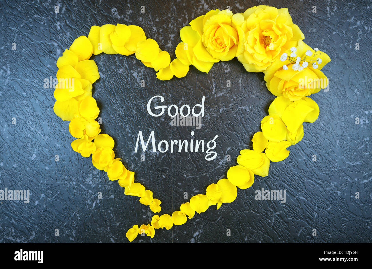 Good morning concept with text inside heart made from fresh yellow ...