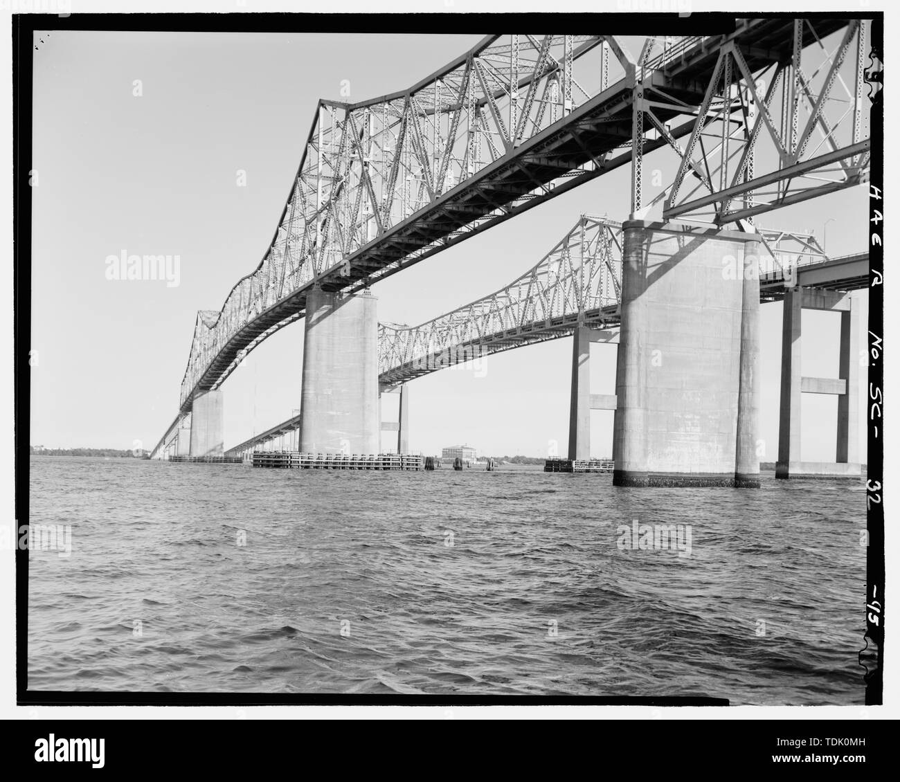 OBLIQUE VIEW OF NORTH SIDE OF COOPER RIVER SPAN, PIER 7, 8, AND 9, FACING SOUTHEAST FROM WATER - Grace Memorial Bridge, U.S. Highway 17 spanning Cooper River and Town Creek , Charleston, Charleston County, SC; Waddell and Hardesty; McClintic-Marshall; The Foundation Company; Virginia Bridge and Iron Company; C.E. Hillyer Company; South Carolina Department of Transportation; Allen, Charles R; Barkerding, Harry; Grace, John P; Sullivan, J Frank; Cooper River Bridge, Inc.; U.S. War Department; H.M. Byllesby and Company; Shinners, J J; Pohl, W H; Allen, Charles K; Isle of Palms, Inc.; Hardaway Con Stock Photo