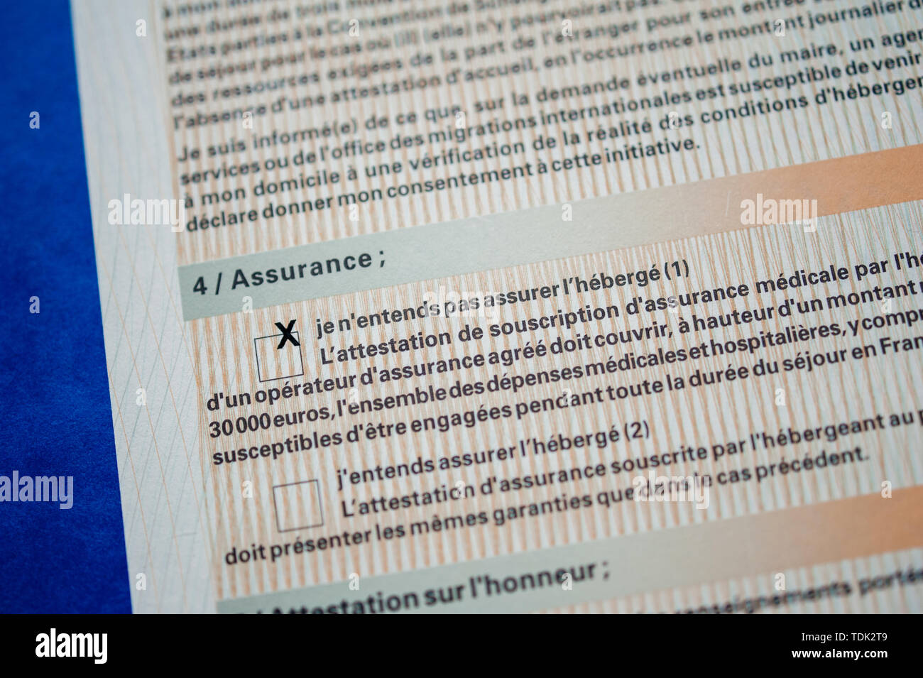 Paris, France - Apr 10, 2013: Detail of Attestation d'accueil Proof of  Accommodation for visitors from other countries to France marked - visitor  is responsible for healthcare insurance Stock Photo - Alamy
