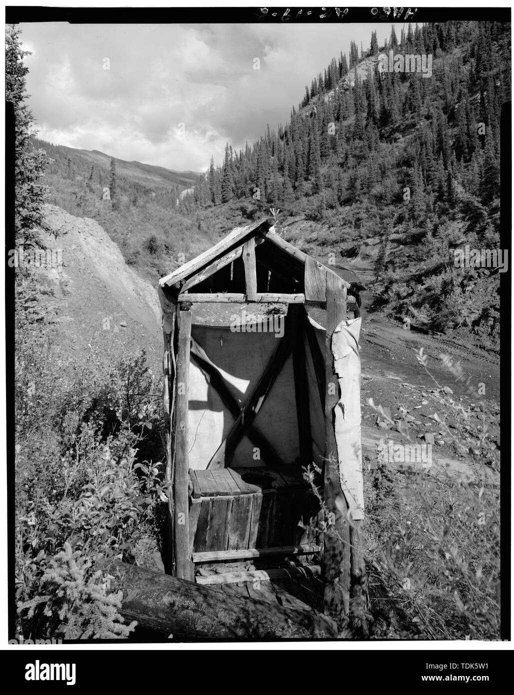 OUTHOUSE, FRONT, VIEW OF THE SOUTHEAST ENTRANCE - Vincent Knorr Cabin, Bettles, Yukon-Koyukuk Census Area, AK Stock Photo