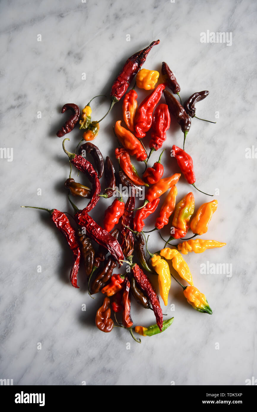 Chillies on Marble Stock Photo