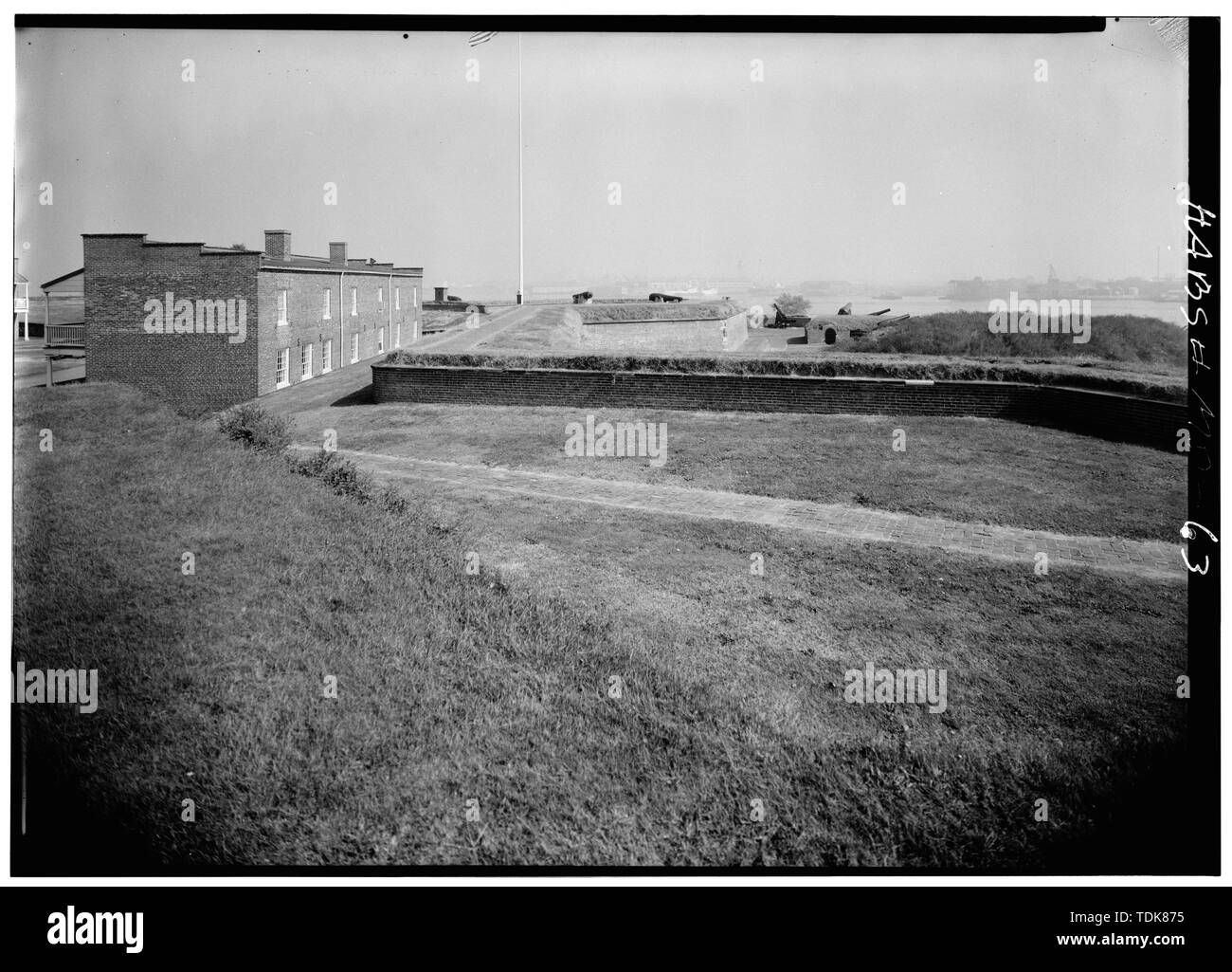 October 1958 VIEW OF SOUTH BASTION (FOREGROUND) LOOKING TOWARD NO. 2 SOLDIERS' BARRACKS (BUILDING E) - Fort McHenry National Monument and Historic Shrine, East Fort Avenue at Whetstone Point, Baltimore, Independent City, MD; Fort Whetstone; Key, Francis Scott; Armistead, George; Pickersgill, Mary; Foncin, Jean; U.S. Navy, photographer; Peterson, Charles E., photographer; Boucher, Jack E., photographer; Nelson, Lee H., historian; Carroll, Orville W., delineator; Nelson, Harold A., delineator; Nelson, Trevor, delineator; Barr, Benjamin F., delineator; Wrenn, George L., delineator Stock Photo