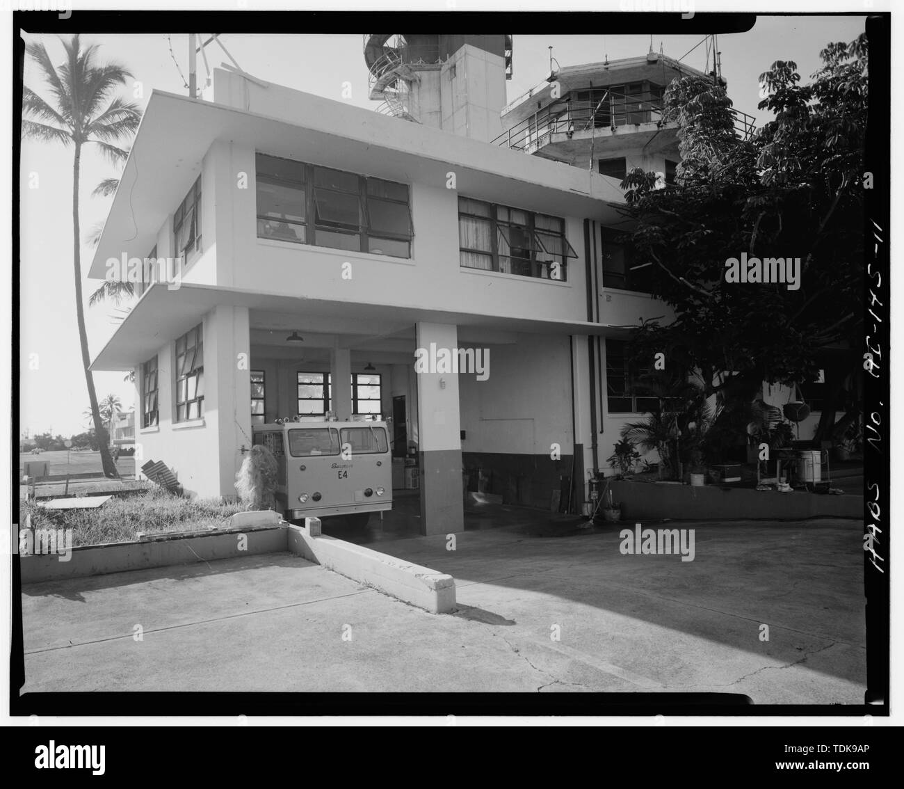 October 1993 VIEW OF FIRE STATION GARAGE, BUILDING S84 FACING SOUTHWEST