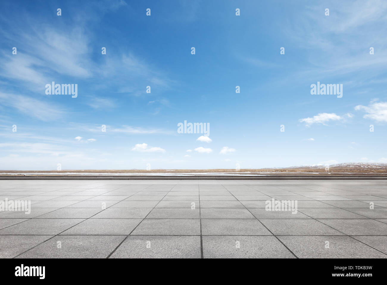Empty marble floor with snow mountains Stock Photo