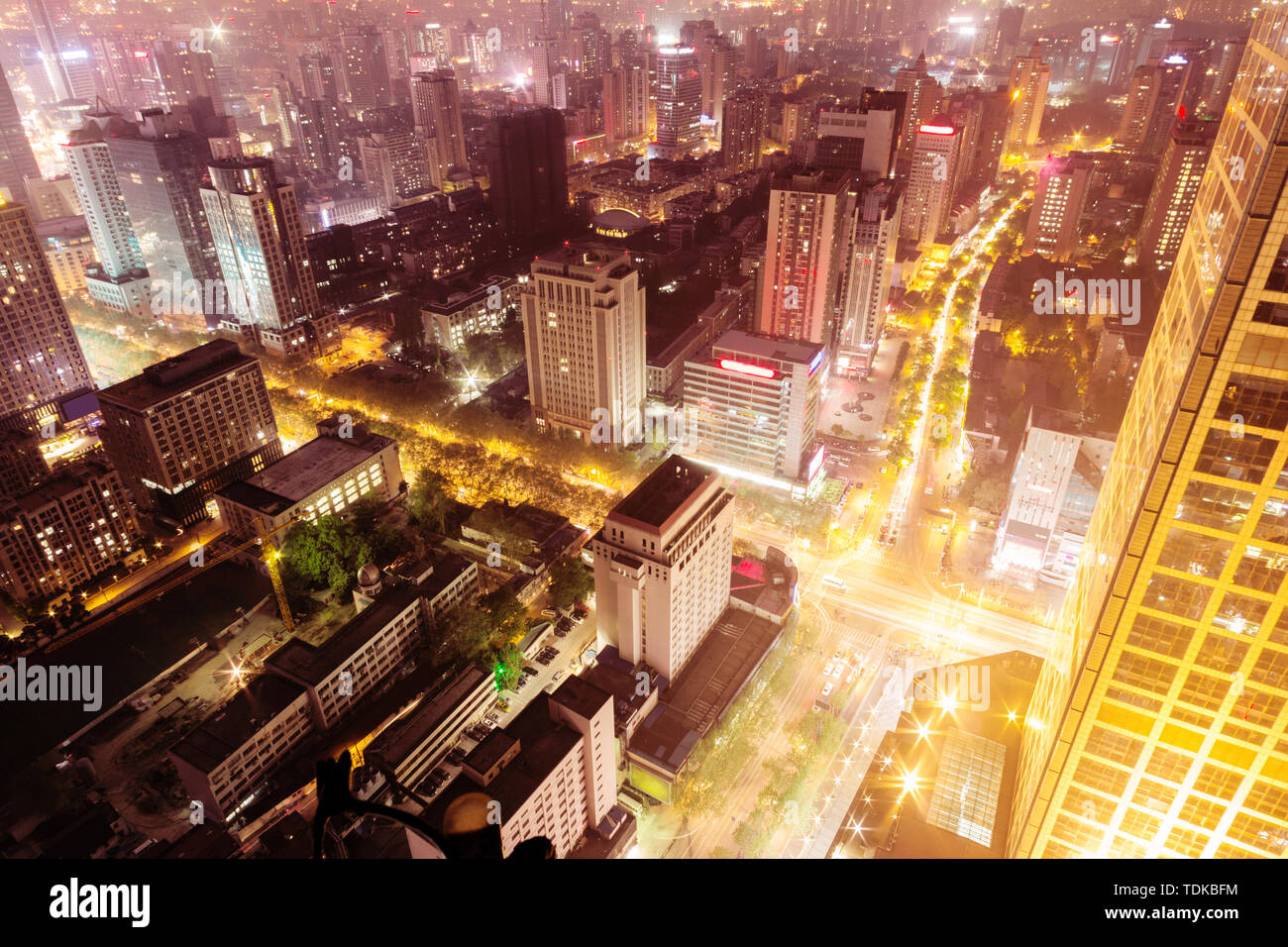 modern office buildings in modern city at night Stock Photo - Alamy