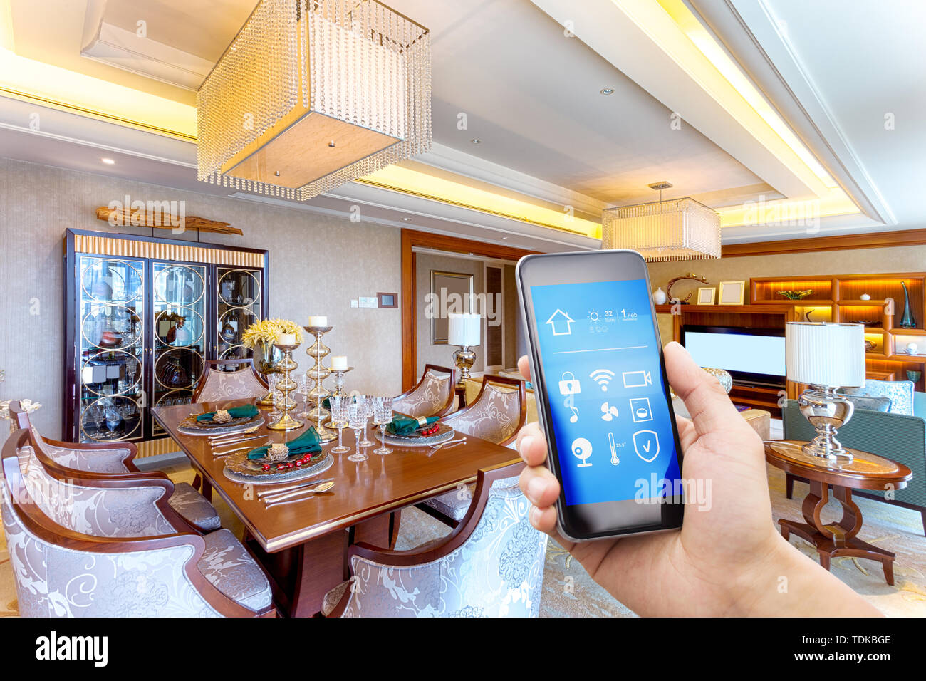 smart phone with smart home and modern dining room Stock Photo - Alamy