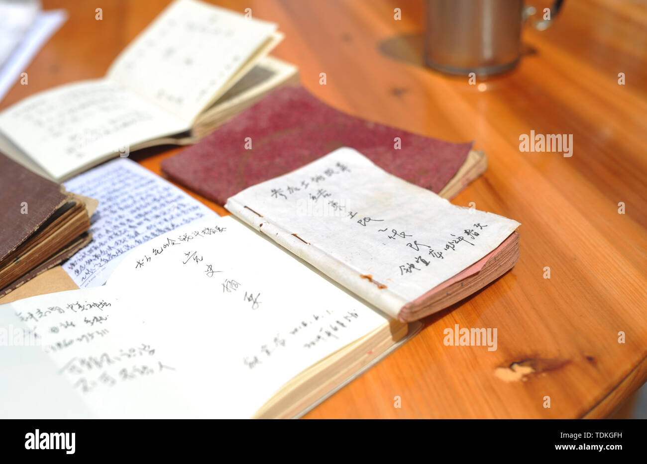 Changting. 16th June, 2019. Photo taken on June 16, 2019 shows the notebooks of Zhong Yilong, a 91-year-old retired cadre, at the Changketou Village of Nanshan Town in Changting County, southeast China's Fujian Province. Since 1953, Zhong Yilong collected the names of martyrs who participated in revolution from 1928 to 1934. He also set up an exhibition regarding the Red Army at his ancestral house several years ago to pass the history down. Credit: Li Renzi/Xinhua/Alamy Live News Stock Photo