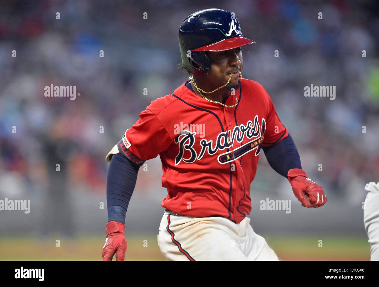 June 14, 2019: Atlanta Braves infielder Ozzie Albies heads to first base on  a ground ball single during the fifth inning of a MLB game against the  Philadelphia Phillies at SunTrust Park
