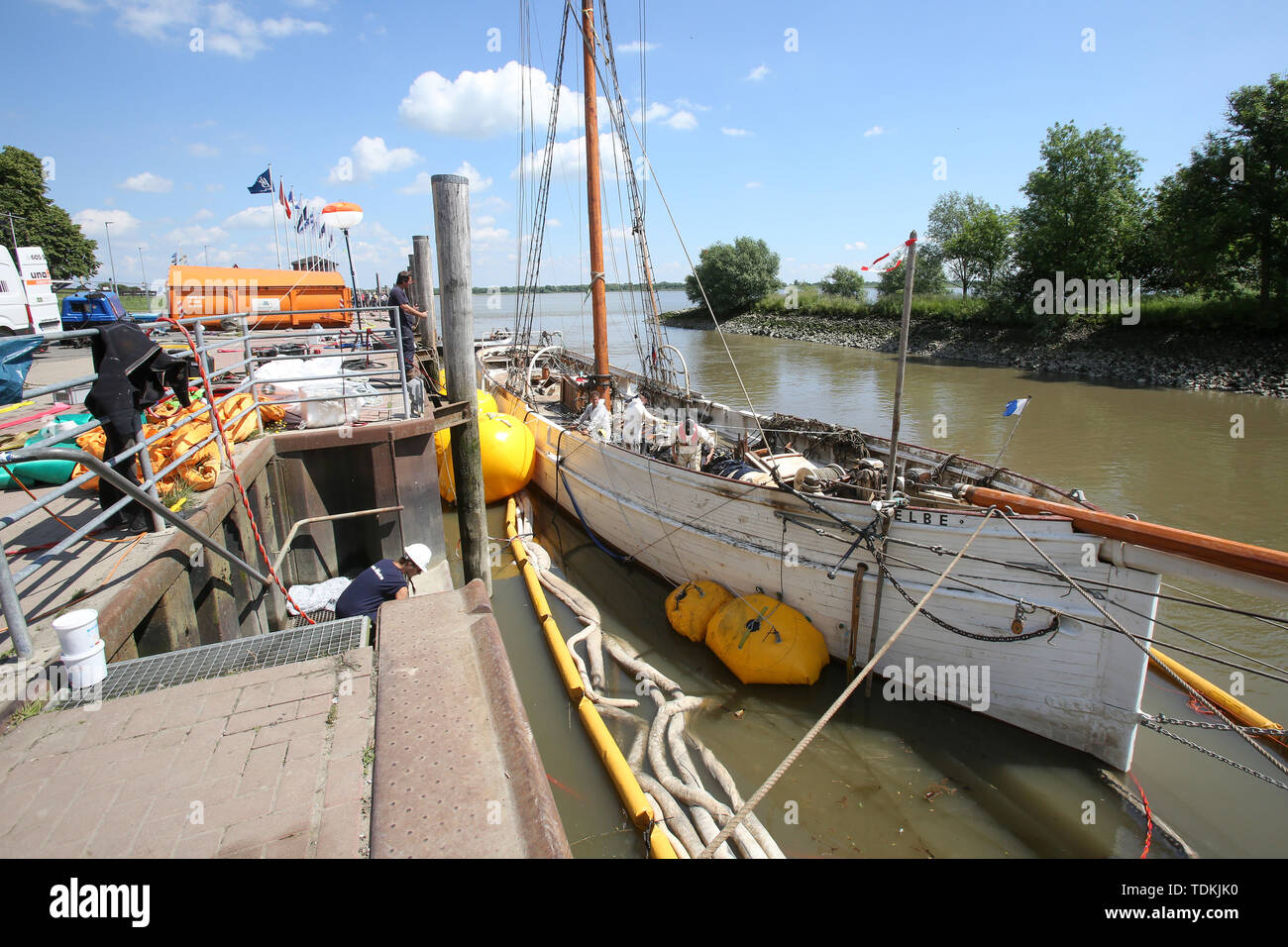 Stadersand, Germany. 17th June, 2019. The sailing ship No. 5 Elbe, which was lifted last night, lies at the pier in Stadersand and is under investigation. The historic pilot schooner, which has only recently been extensively renovated, collided with a container ship on the Elbe and sank. Last night the ship was lifted with air cushions. Credit: Bodo Marks/dpa/Alamy Live News Stock Photo