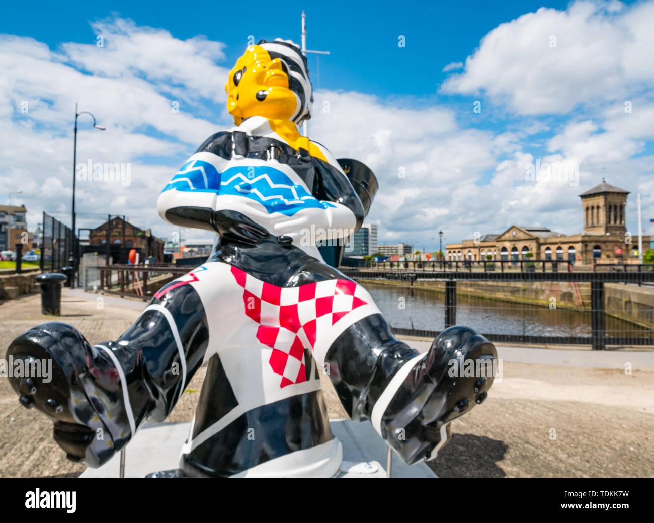 Leith, Edinburgh, Scotland, United Kingdom, 17 June 2019. Oor Wullie's Big Bucket Trail: An art trail of 200 Oor Wullie sculptures appear in Scottish cities in a mass arts event that lasts until August 30th. Oor Wullie is an iconic Scottish cartoon character from the Sunday Post newspaper. The sculptures will be auctioned to raise money for charities There are 5 in the Leith area, and 60 in Edinburgh altogether. Bobby Dazzler by Scott Dawson and Rachel Miller in Alexandra Dock, Leith harbour Stock Photo