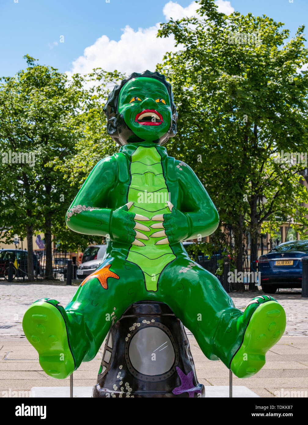 Leith, Edinburgh, Scotland, United Kingdom, 17 June 2019. Oor Wullie's Big Bucket Trail: An art trail of 200 Oor Wullie sculptures appear in Scottish cities in a mass arts event that lasts until August 30th. Oor Wullie is an iconic Scottish cartoon character. The sculptures will be auctioned to raise money for Scotland’s children’s hospital charities There are 5 in the Leith area, and 60 in Edinburgh altogether. Oor Wullie by Ruairidh Brunton Stock Photo