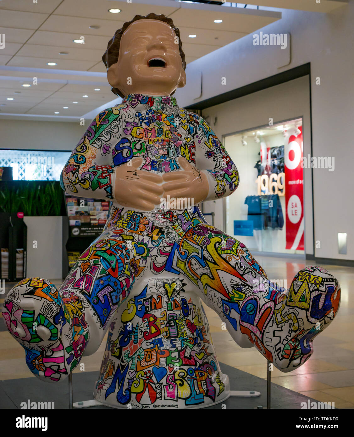 Leith, Edinburgh, Scotland, United Kingdom, 17 June 2019. Oor Wullie's Big Bucket Trail: An art trail of 200 Oor Wullie sculptures appear in Scottish cities in a mass arts event that lasts until August 30th. Oor Wullie is an iconic Scottish cartoon character. The sculptures will be auctioned to raise money for charities. There are 5 in the Leith area, and 60 in Edinburgh altogether. The Proclaimers, Craig Reid, at Ocean Terminal by Vanessa Gibson Stock Photo