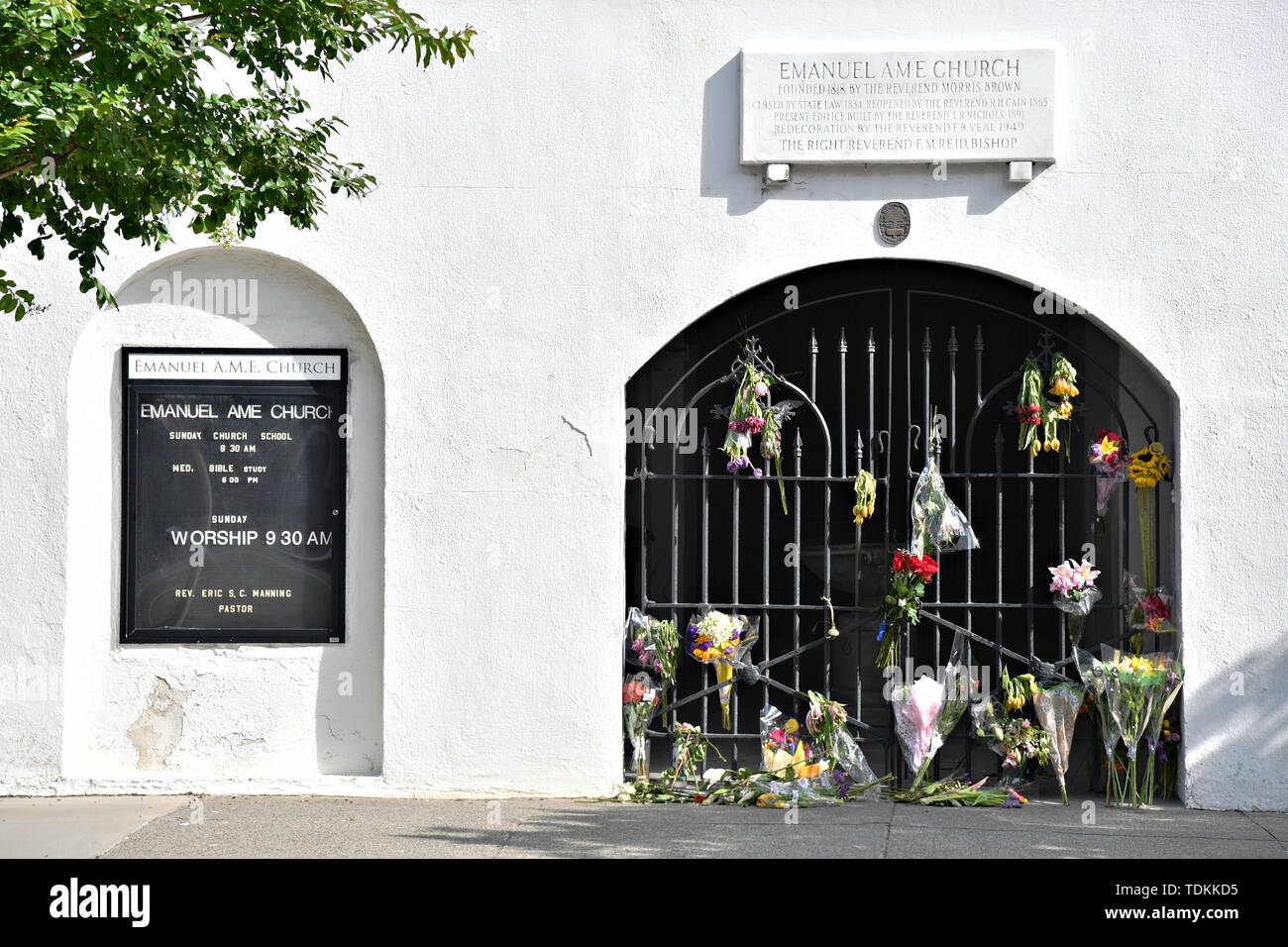 Charleston, United States. 17th June, 2019. Floral bouquets on the gate at the historic Mother Emanuel African Methodist Episcopal Church on the 4th anniversary of the mass shooting June 17, 2019 in Charleston, South Carolina. Nine members of the historically black congregation were gunned down during bible study by a white supremacist on June 17, 2015. Credit: Planetpix/Alamy Live News Stock Photo
