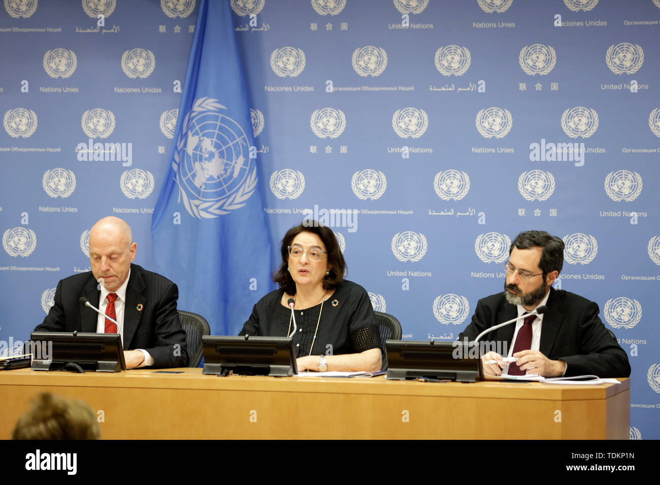 (190617) -- UNITED NATIONS, June 17, 2019 (Xinhua) -- John Wilmoth, Director of the Population Division of the UN Department of Economic and Social Affairs (UNDESA), Maria-Francesca Spatolisano, Assistant Secretary-General for Policy Coordination and Inter-Agency Affairs in UNDESA, and Patrick Gerland, Chief of the Population Estimates and Projections Section of the Population Division of UNDESA (from L to R), brief journalists on the World Population Prospects 2019: Highlights, at the UN headquarters in New York, June 17, 2019. The world's population is expected to increase by 2 billion in th Stock Photo