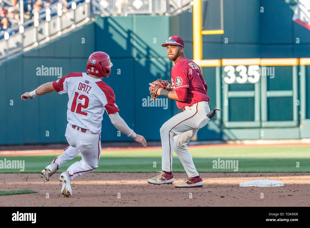 Omaha, NE U.S. 15th June, 2019. Arkansas Casey Opitz #12 is forced out ...