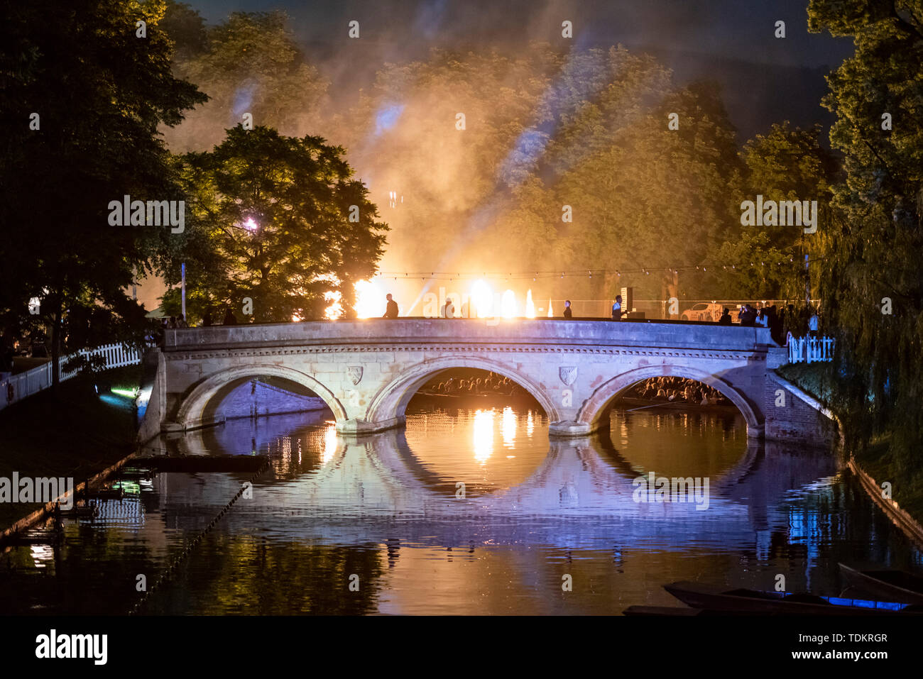 Cambridge UK 17th June 2019. Fireworks light up the summer sky over the Backs and the River Cam at the Trinity College May Ball as students celebrate the end of term. Various Cambridge University Colleges hold the traditional balls in May Week, which is in June, with lavish entertainment, food, drink and partying. Credit Julian Eales/Alamy Live News Stock Photo