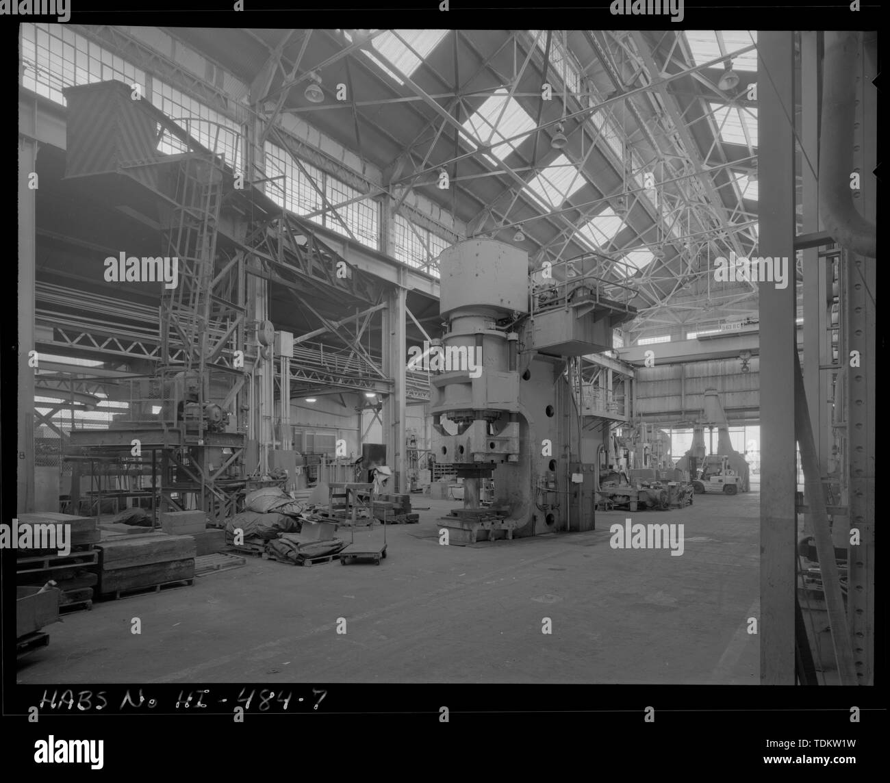 Oblique interior view of main space showing the single-casting steel press. View facing west-southwest - U.S. Naval Base, Pearl Harbor, Forge Shop and Galvanizing Shop, Sixth Street between Avenues D and E, Pearl City, Honolulu County, HI Stock Photo