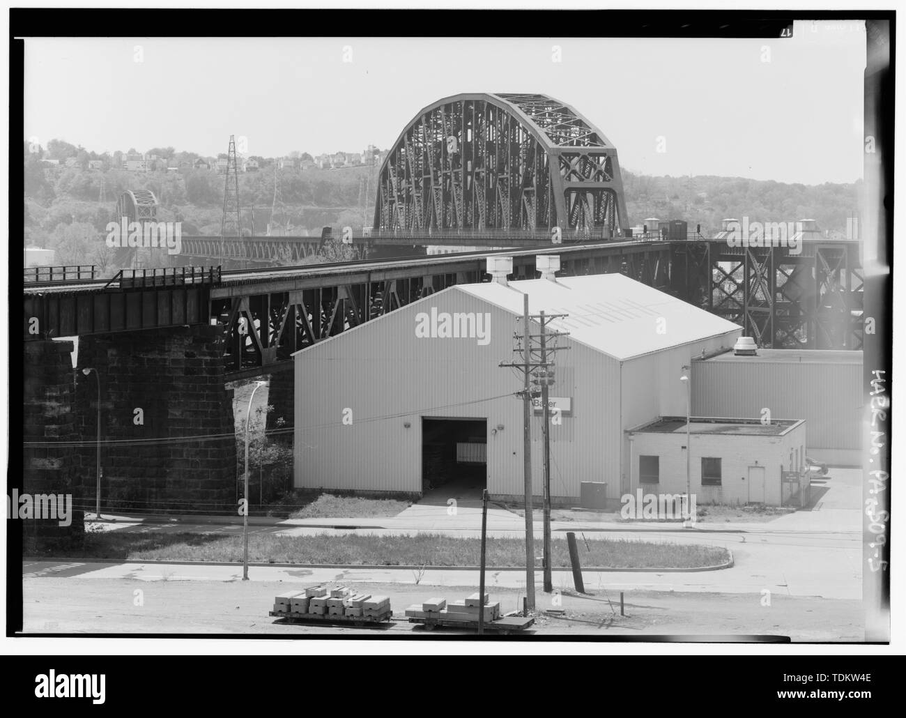 Oblique overview of Brunot's Island Bridge, looking SW. From inside of Pittsburgh, Fort Wayne and Chicago Railway Wye. - Ohio Connecting Railway, Brunot's Island Bridge, Spanning Ohio River at Brunot's Island, Pittsburgh, Allegheny County, PA; Becker, Max J; Bland, J C; American Bridge Company; Drake and Stratton Company; Seaboard Construction Company; Duquesne Light Company; Pittsburgh, Cincinnati, Chicago and St. Louis Railroad; Ohio Connecting Railway; Pennsylvania Railroad; Pittsburgh, Fort Wayne and Chicago Railway; Pittsburgh, Chartiers and Youghiogheny Railroad; Consolidated Rail Corpor Stock Photo