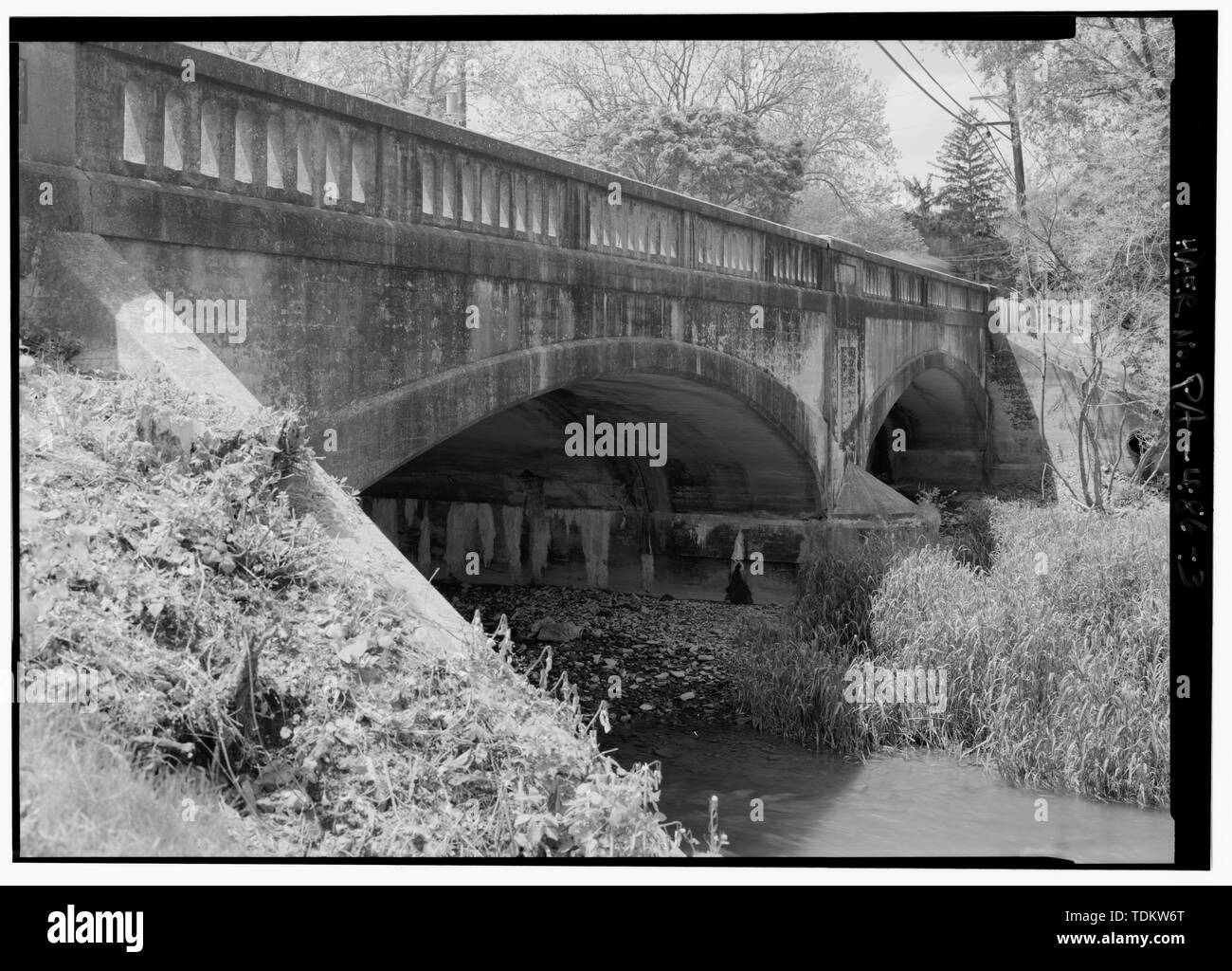 Oblique perspective, looking west. - Little Conewago Creek Bridge, Spanning South Branch of Conewago Creek at Lincoln Highway (U.S. Route 30), New Oxford, Adams County, PA; Williams, Charles A; Wagman, George A; Wagman, Fred M; Pennsylvania Department of Highways; DeLony, Eric N, project manager; Pennsylvania Department of Transportation, sponsor; Pennsylvania Historical and Museum Commission, sponsor; Hawley, Haven, historian; Lowe, Jet, photographer Stock Photo