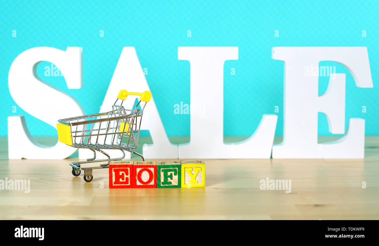 End of Financial Year sales shopping concept with mini shopping cart