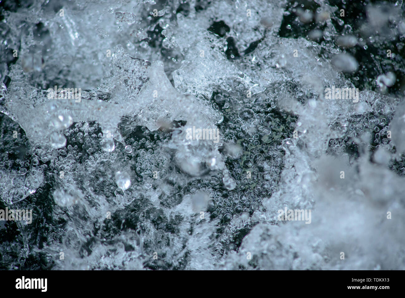 A Bead Of Water Formed By The Impact Of The Flow Stock Photo - Alamy