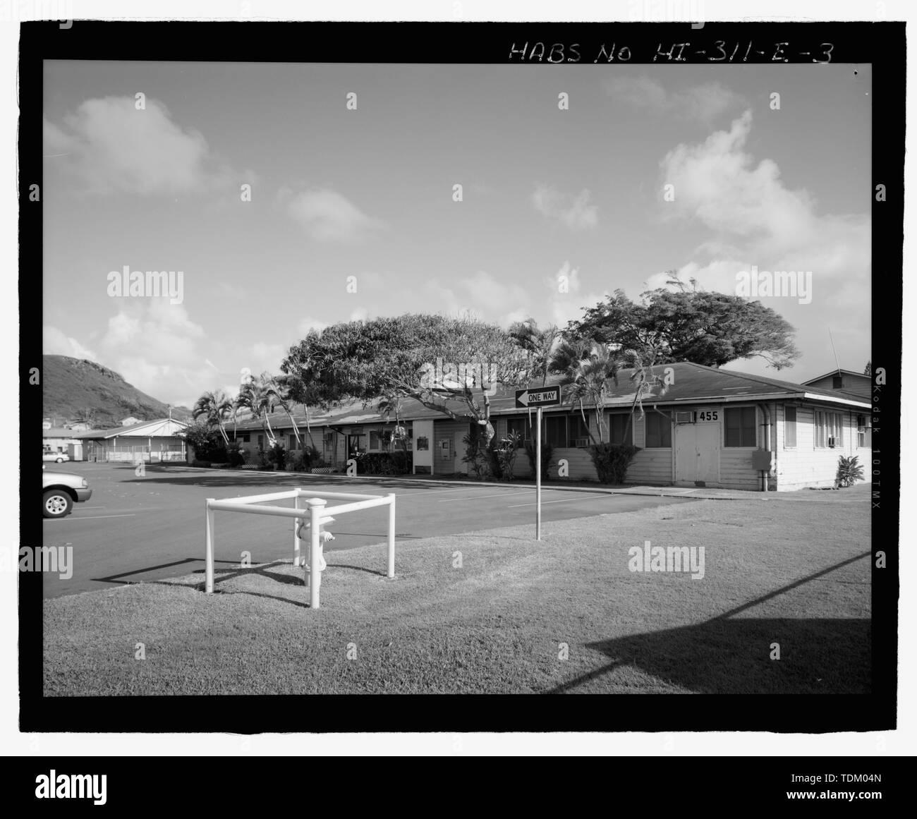 Oblique view of the south side of Building 455, view facing northwest