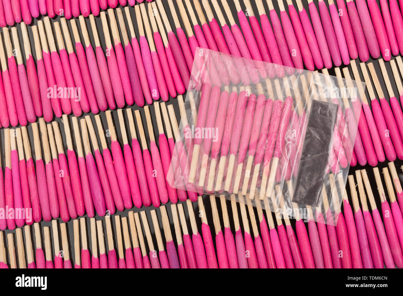 Neat rows of waterproof stormproof emergency matches. Metaphor survival skills, organized mind, neat and tidy mind, regimented, lined up, in neat line Stock Photo