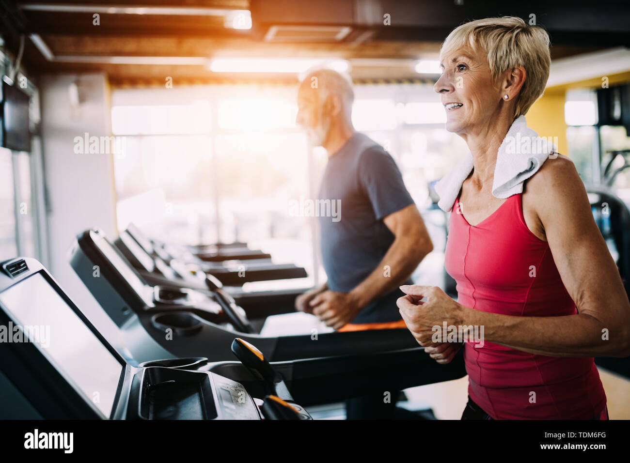 Image of attractive fit senior woman in gym Stock Photo - Alamy