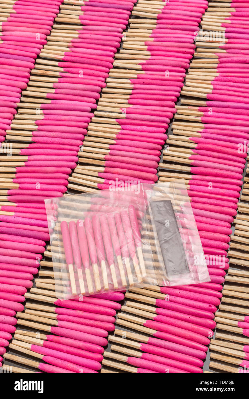 Neat rows of waterproof stormproof emergency matches. Metaphor survival skills, organized mind, neat and tidy mind, regimented, lined up, in neat line Stock Photo
