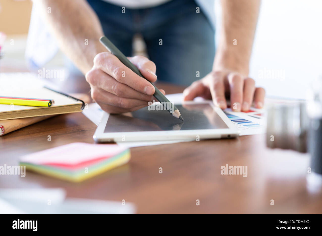 Graphic Designer working with interactive pen display, digital Drawing tablet and Pen on a computer Stock Photo