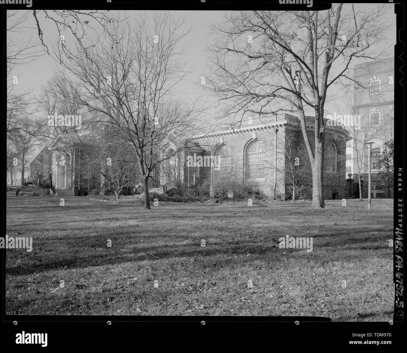 PERSPECTIVE VIEW OF SOUTHEAST FRONT AND NORTHEAST SIDE, LOOKING WEST - Free Library of Philadelphia, Germantown Branch, 5818 Germantown Avenue (in Vernon Park), Philadelphia, Philadelphia County, PA; Carnegie, Andrew; Preservation Alliance of Greater Philadelphia, sponsor Stock Photo