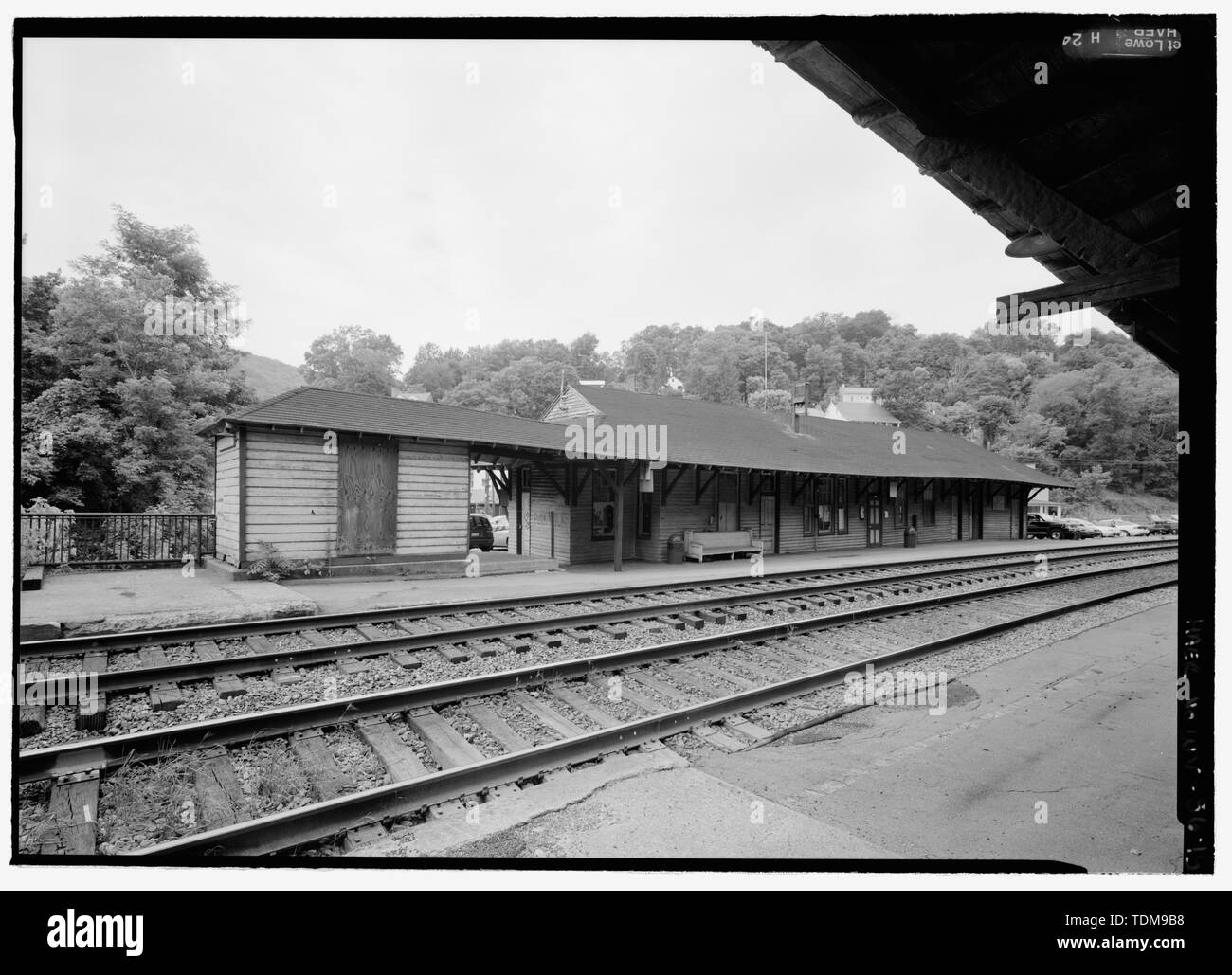 PERSPECTIVE VIEW OF STATION. - Baltimore and Ohio Railroad, Harpers Ferry Station, Potomac Street, Harpers Ferry, Jefferson County, WV; Baldwin, E Francis; Latrobe, Benjamin; Bollman, Wendell; Sisson, William Lee; Penncoyd Bridge and Construction Company; McLean, James; Savery, Thomas E; Niernsee and Nielson; Garrett, John W; Pennington, Josias; Empire Construction Company; American Bridge Company; Lang, Philip G; Campbell, Don, sponsor; Dessauer, Peter, sponsor; Hebb, Bill, sponsor; Graves, Matthew, sponsor; Capone, Stephen, sponsor; Marston, Christopher, project manager; Stowell, Walton D, f Stock Photo