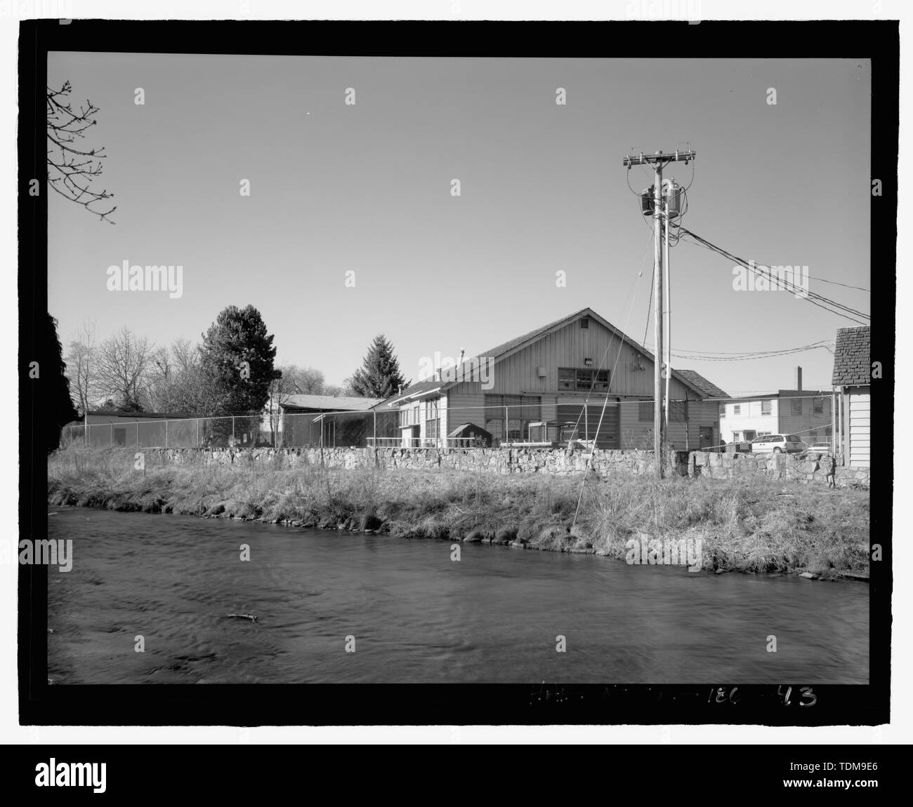 PERSPECTIVE VIEW OF THE AUTOMOTIVE SHOP, VIEW LOOKING NORTHWEST, WITH ...