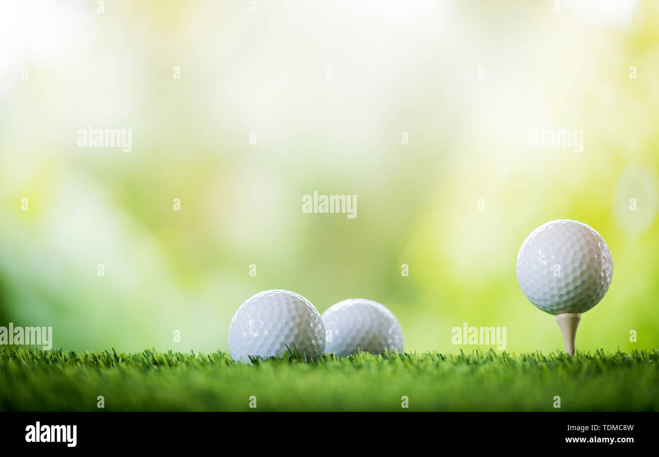golf ball on tee to tee off Stock Photo