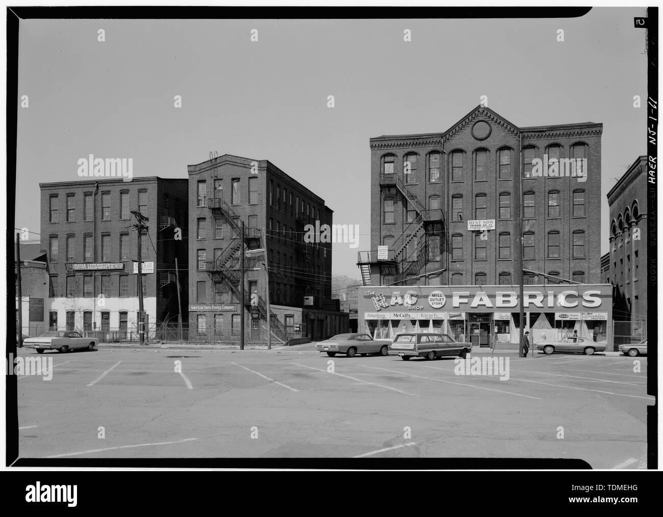 PHOENIX, HARMONY, AND INDUSTRY MILLS- SOUTH ELEVATIONS. - Great Falls-S. U. M. Historic District, Oliver Street, Paterson, Passaic County, NJ Stock Photo