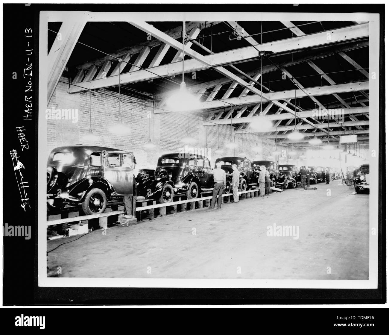 PHOTOCOPY OF CA. 1934 VIEW OF ASSEMBLY LINE - Lexington Motor Company, Eighteenth Street and Columbia Avenue, Connersville, Fayette County, IN; Lexington-Howard Company; Cord, Errett Lobban; Moore, John C; Stone , Kinsey; Boucher, Jack E; Rosenberg, Robert; Sackheim, Donald Stock Photo