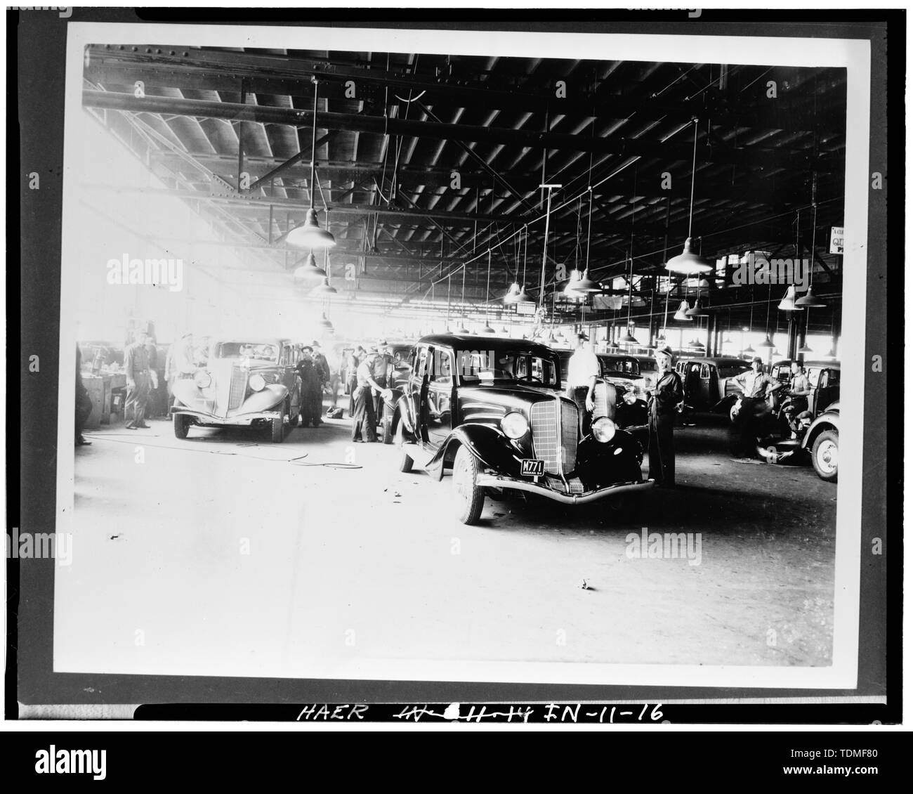 PHOTOCOPY OF CA. 1934 VIEW OF AUTOS COMING OFF ASSEMBLY LINE - Lexington Motor Company, Eighteenth Street and Columbia Avenue, Connersville, Fayette County, IN; Lexington-Howard Company; Cord, Errett Lobban; Moore, John C; Stone , Kinsey; Boucher, Jack E; Rosenberg, Robert; Sackheim, Donald Stock Photo