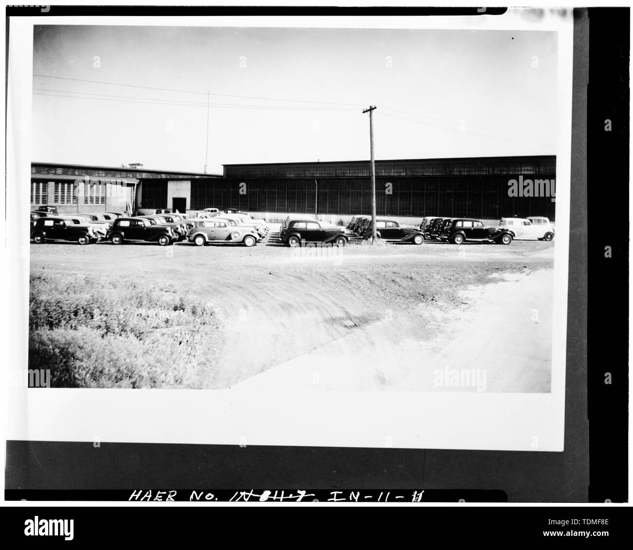 PHOTOCOPY OF CA. 1934 VIEW OF COMPLETED AUTO STORAGE LOT - Lexington Motor Company, Eighteenth Street and Columbia Avenue, Connersville, Fayette County, IN; Lexington-Howard Company; Cord, Errett Lobban; Moore, John C; Stone , Kinsey; Boucher, Jack E; Rosenberg, Robert; Sackheim, Donald Stock Photo