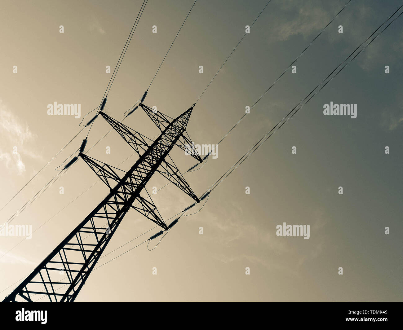 High-voltage transmission lines of electric energy. Electrical network. Stock Photo